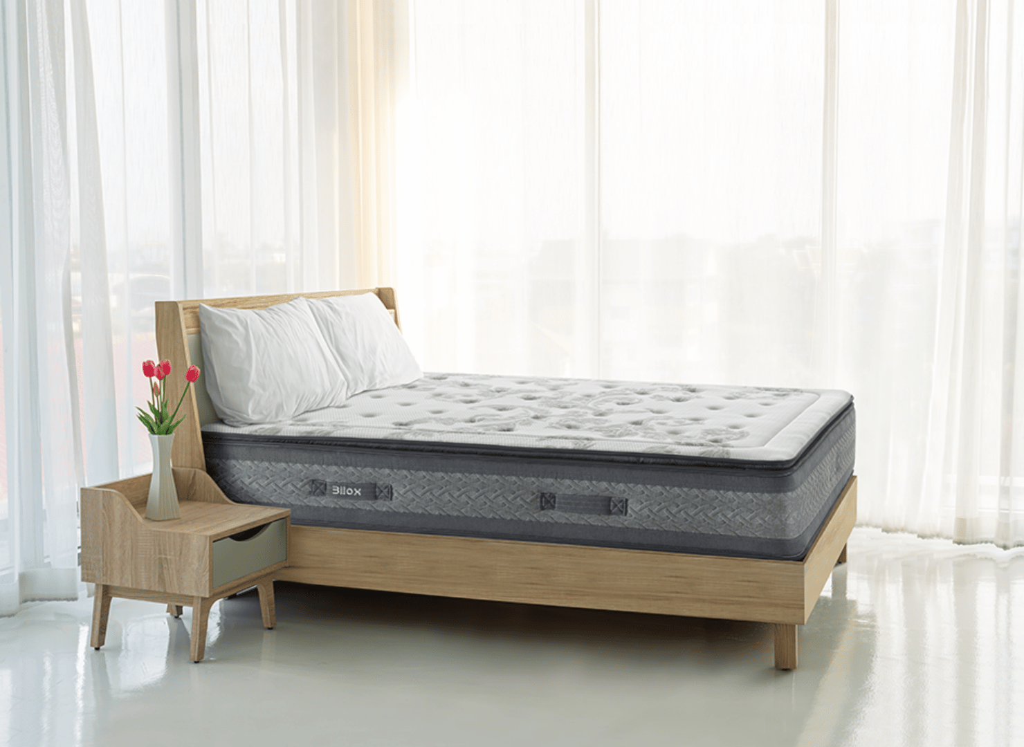 Colchón Slaap en dormitorio con soporte de madera