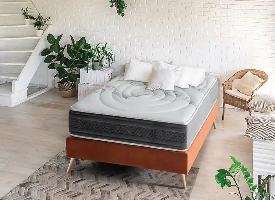 Ambiente dormitorio del colchón maxter sobre un soporte moderno y versátil