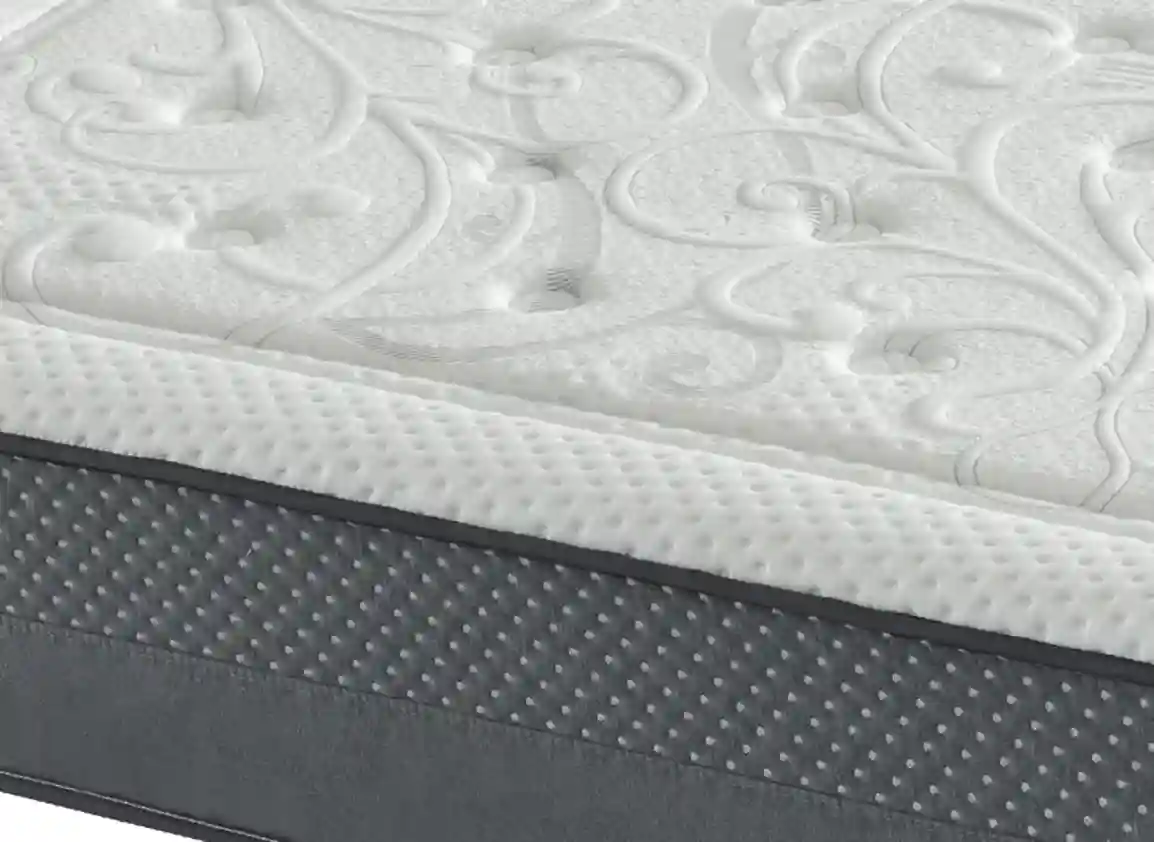 Vista lateral del colchón orión spa con detalles en la cara superior