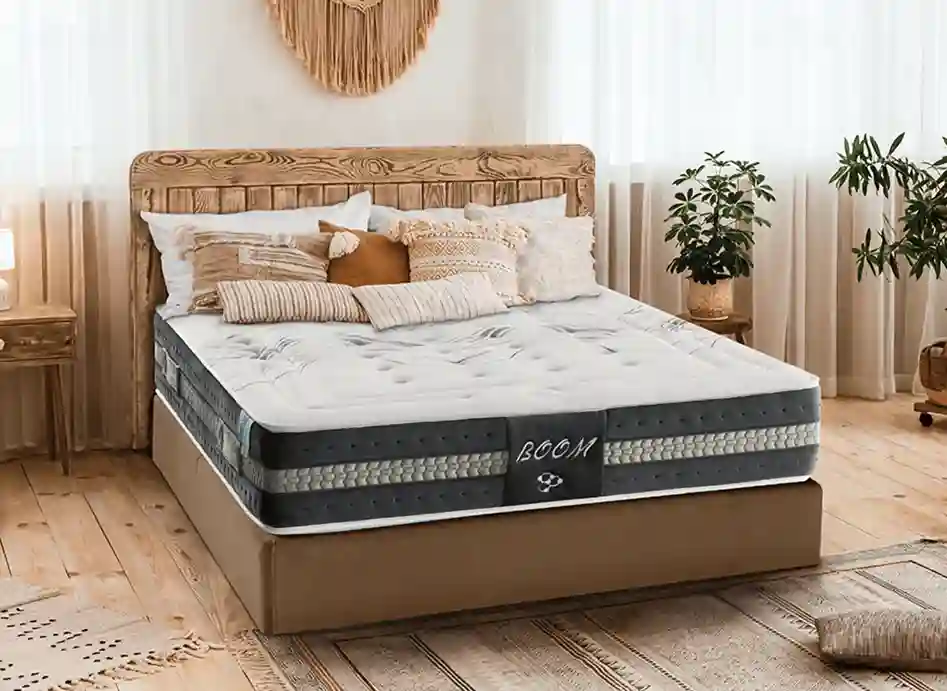 Colchones viscoelásticos modelo boom en habitación con tonos naturales, piso y cabeceros de madera y base tapizada
